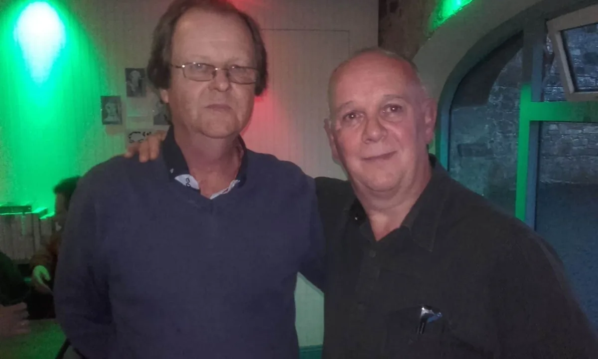 Donal Coghlan with a guest at an independent music community event